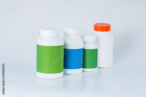 Close up picture of several bottles of vitamins