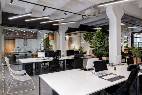 modern loft office interior with furniture