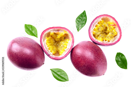 fresh passion fruits with leaves isolated on white background. top view