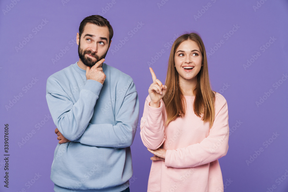 Happy girl have an idea near thinking boyfriend Happy girl have an idea near thinking boyfriend