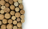 Wine corks from above, with soft shadow against white background. Copy space on right.