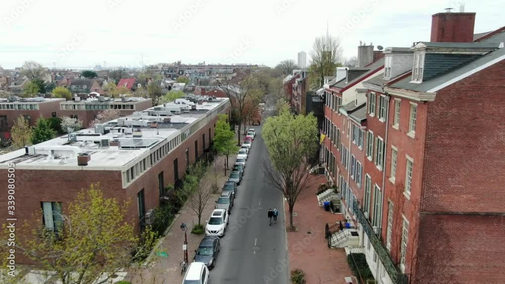 Street scene, establishing shot, historic urban city in USA residential district, no traffic, Covid quarantine shutdown shelter in place, coronavirus stay home, spring time season Street scene, establishing shot, historic urban city in USA residential district, no traffic, Covid quarantine shutdown shelter in place, coronavirus stay home, spring time season