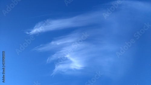 book cover. blue sky and white clouds. clouds against blue sky background