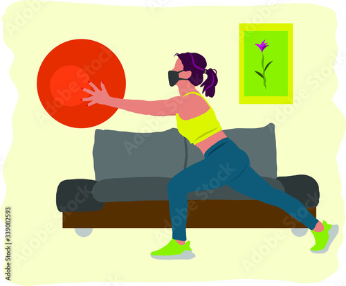 A girl in a protective mask is engaged in fitness at home in quarantine.