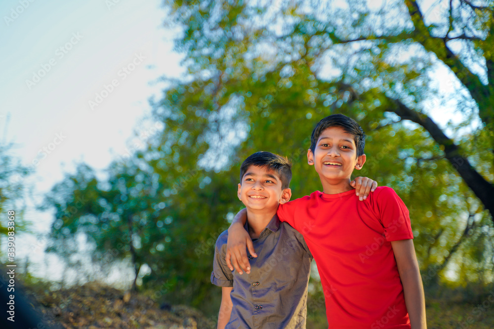 two little indian brother hugging to each other two little indian brother hugging to each other