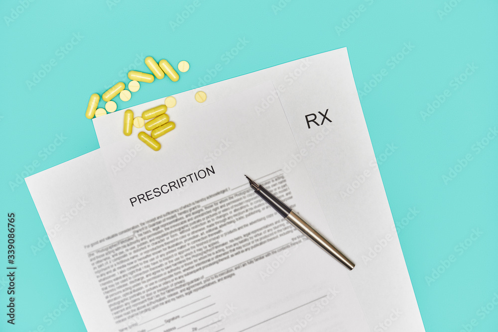 rx prescription form for tablets. blue background rx prescription form for tablets. blue background
