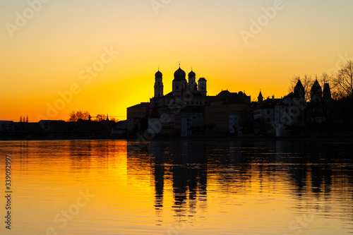 Cityscape of Passau with famous St. Stephan'c Cathedral at the confluence of Danube, Inn and Ilz at dusk