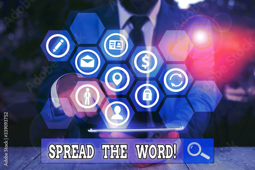 Writing note showing Spread The Word. Business concept for share the information or news using social media