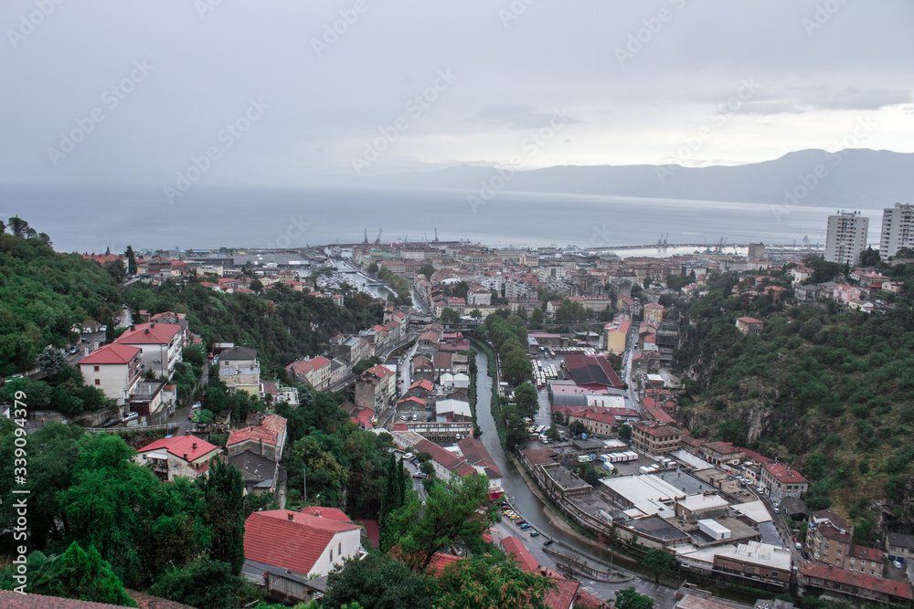 Rijeka Croatia city view from the top of the mountain Trsat Fortress rainy day and evening time