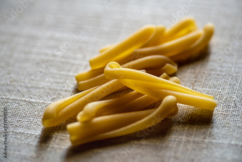 Uncooked Italian Casarecce pasta photo