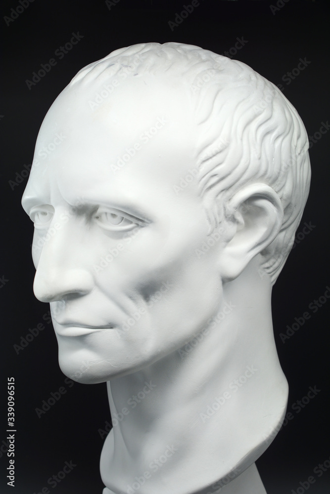 julius caesar roman emperor gypsum bust on black background julius caesar roman emperor gypsum bust on black background