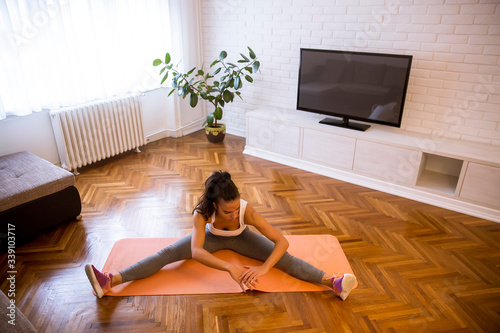 Attractive female doing str...
