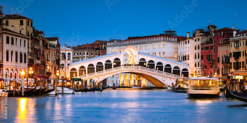 Rialto bridge on the Grand Canal at night, Venice, Italy