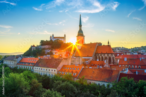 Bratislava castle over Danube river after sunset in the Bratislava old town, Slovakia photo