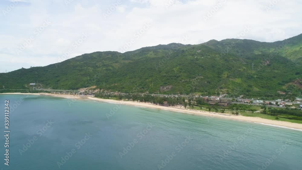 Aerial view of Dai Lanh beach, Van Ninh, Khanh Hoa. Situated at the south central coast of Vietnam,a two-kilometre bay with a fishing village at one end & a beach at the other Aerial view of Dai Lanh beach, Van Ninh, Khanh Hoa. Situated at the south central coast of Vietnam,a two-kilometre bay with a fishing village at one end & a beach at the other