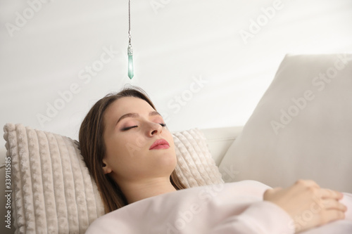 Fotografie Patient on sofa during hypnotherapy session in office