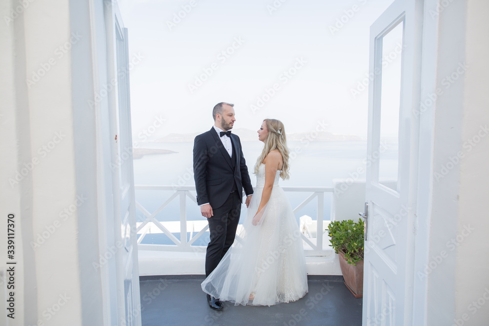 Happy beautiful wedding couple enjoying the time together in a luxury location