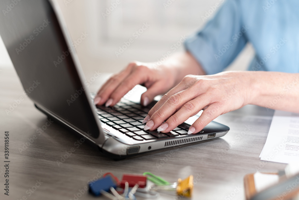 Businesswoman working on laptop Businesswoman working on laptop