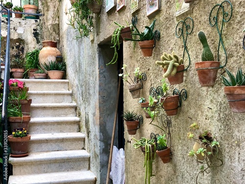 Wall of a home with flowers located on top of Mount Erice, Italy