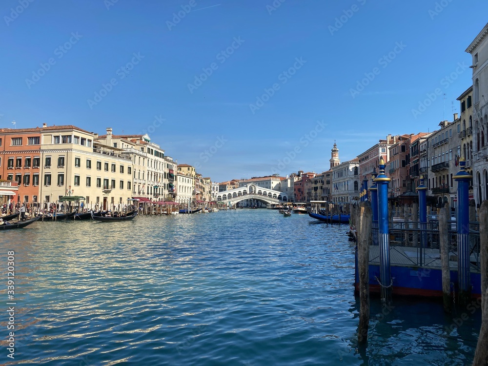 Island murano in Venice Italy. View on canal with boat and motorboat water