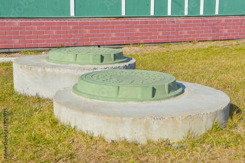 manhole sewer cleaning system on the ground on a Sunny spring day