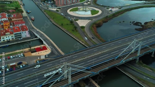 Aerial daily traffic on a bridge spanning a canal Aveiro, Portugal, considered equivalent to Venice