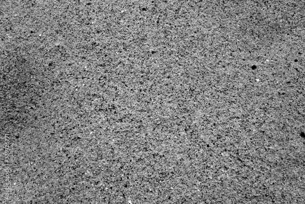 Beach sea sand close-up in black and white. Beach sea sand close-up in black and white.