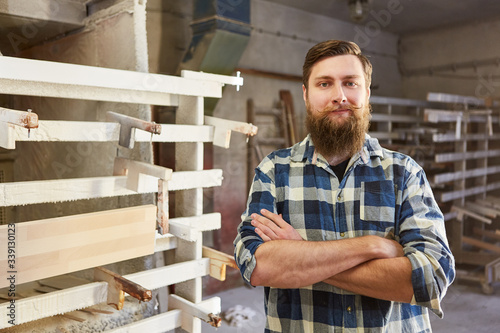 Hipster carpenter with crossed arms