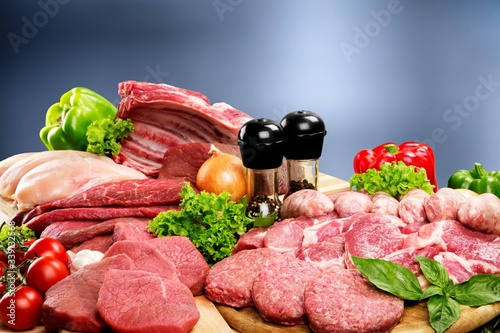 Freshness meat collection on wooden desk with vegetables