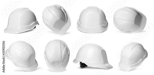 Set with construction safety hardhat on white background. Banner design photo