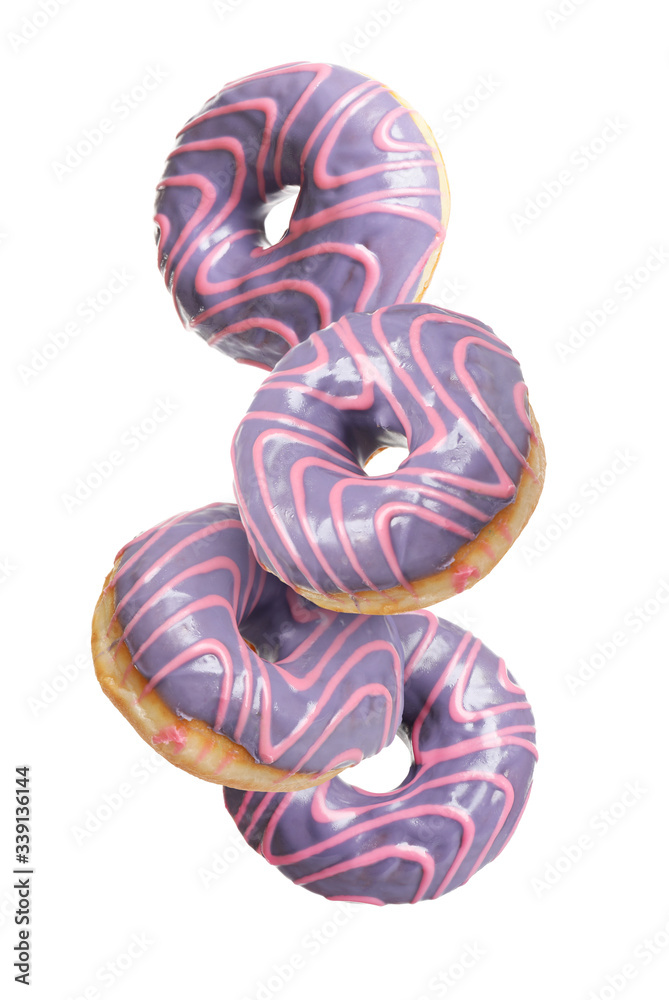 Set of falling delicious donuts on white background Set of falling delicious donuts on white background