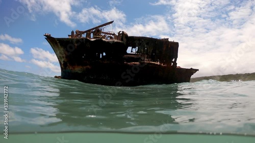 Side view of Meisho Maru Shipwreck at Cape Agulhas southernmost tip of Africa, Low water surface shot