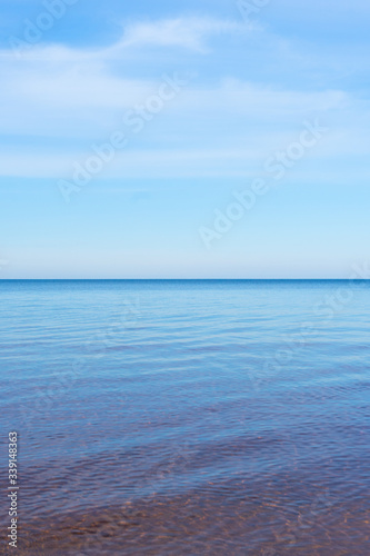 selective focus, smooth horizon line, blue lake