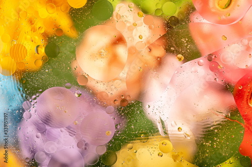 Multicolored background with colorful water and oil drops