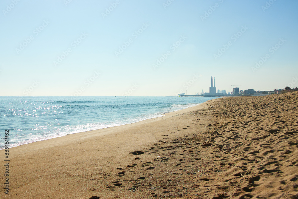 Barceloneta beach at sunrise in Barcelona, Spain