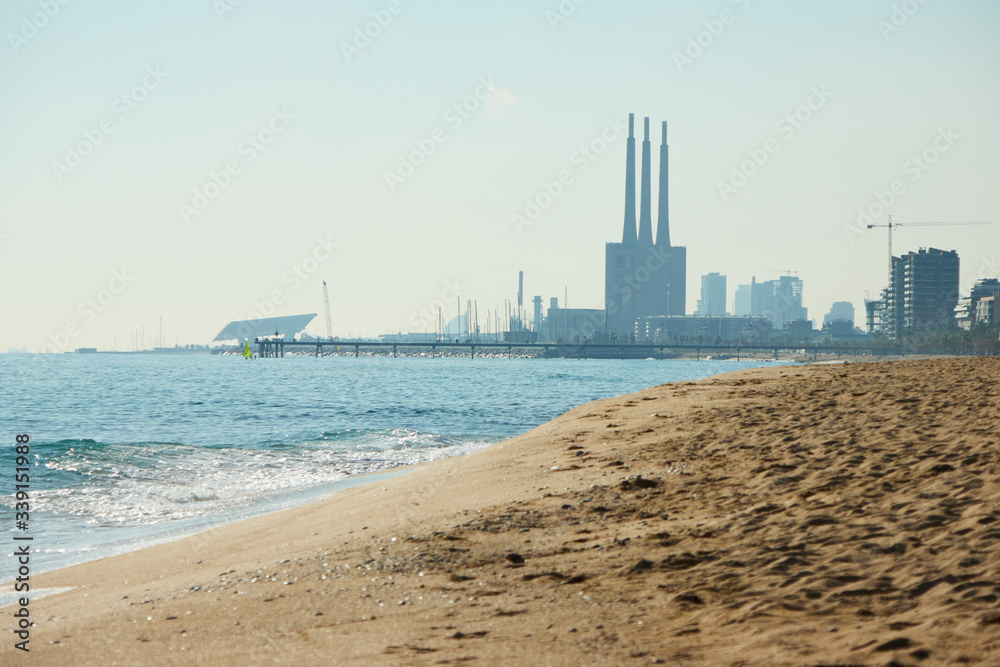 Barceloneta beach at sunrise in Barcelona, Spain