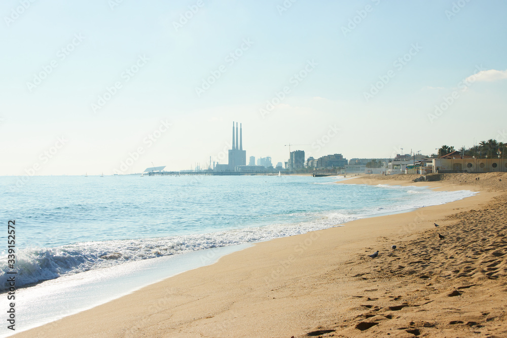 Barceloneta beach at sunrise in Barcelona, Spain