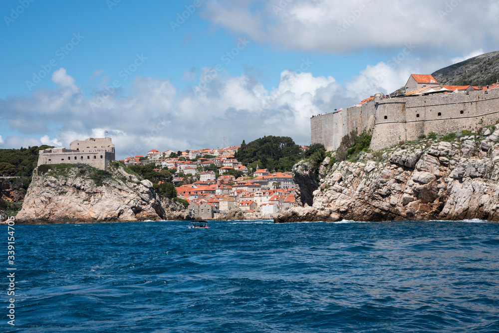 Views from the sea of the city of Dubrovnik in Croatia, Europe. Beautiful view of the Dalmatian coast from the Adriatic Sea.