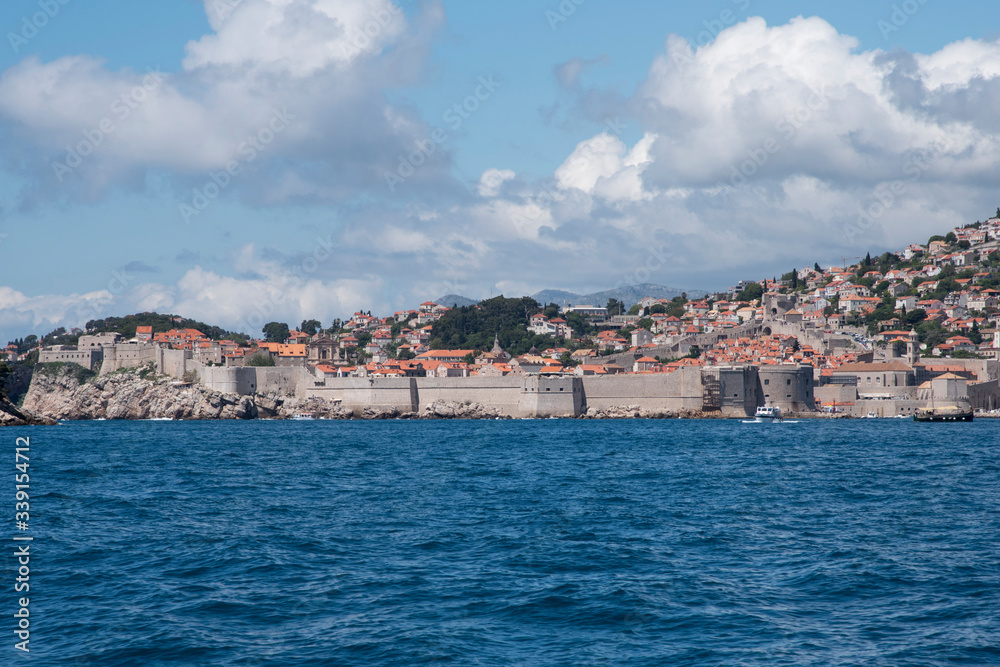 Fototapeta premium Views from the sea of the city of Dubrovnik in Croatia, Europe. Beautiful view of the Dalmatian coast from the Adriatic Sea.