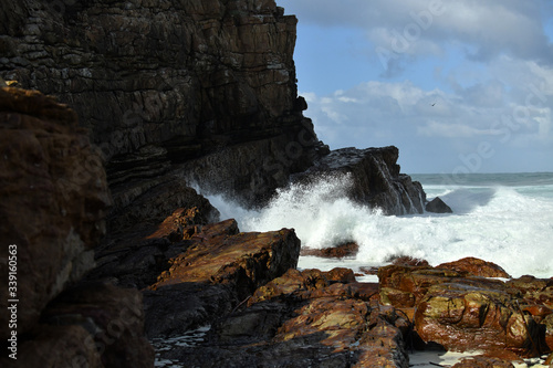 raging ocean with large white waves in the region of the cape of good hope in the south african republic