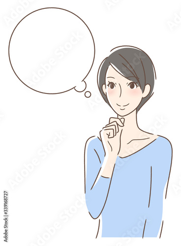 笑顔で想像する女性