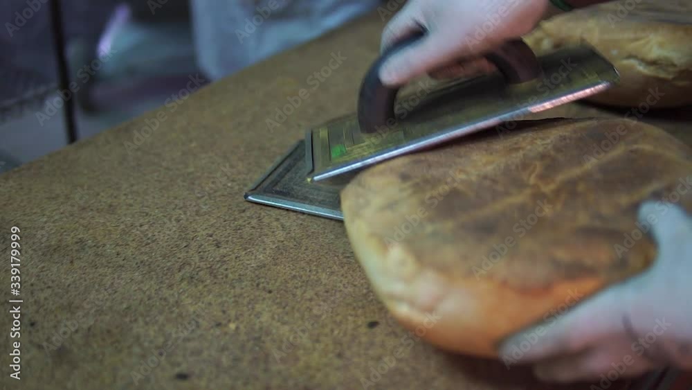 Freshly baked bread comes out of the bread oven. Freshly baked bread comes out of the bread oven.