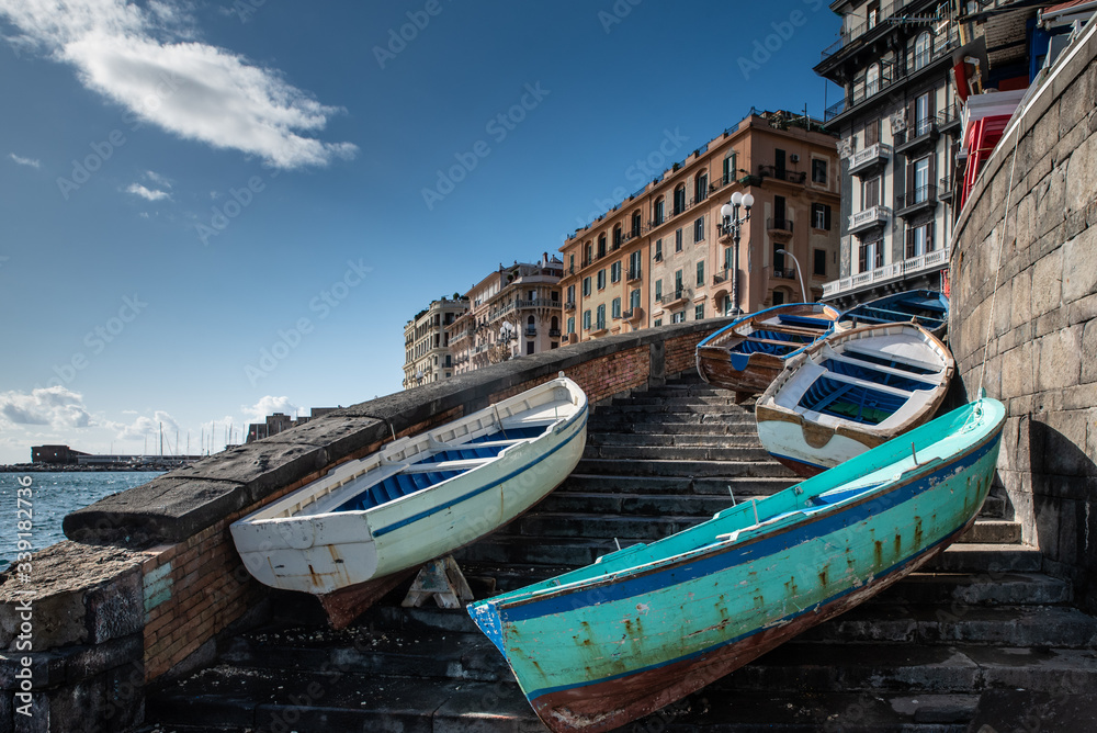 Boats on the stairs in Naples