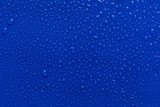 close up abstract water drops blue background