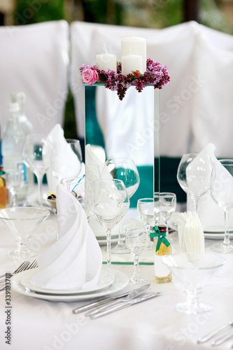 Detail of wedding banquet tables with flowers decoration