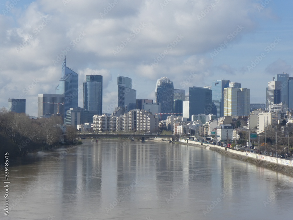 La Défense business district and The Seine seen from Levallois's bridge, France