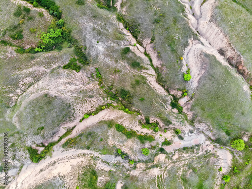 Aerial view erosion process on terrain surface photo