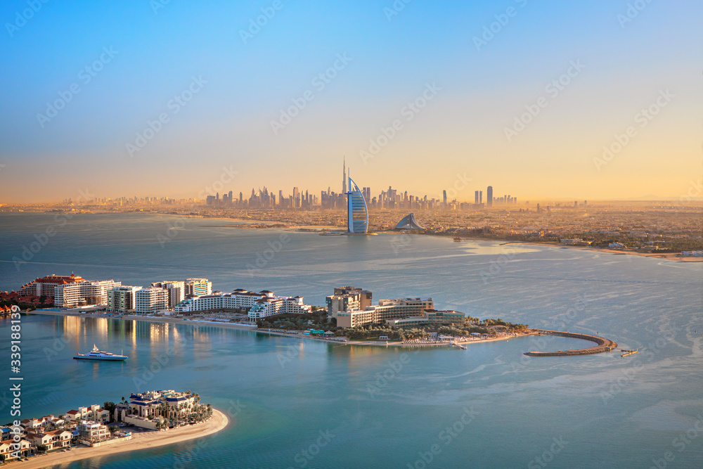 Dubai - aerial view skyline of Dubai city and famous Jumeirah beach, United Arab Emirates