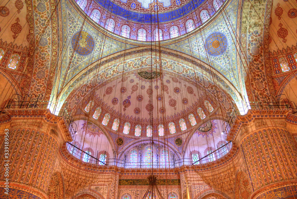 Istanbul, Turkey - Nov 26th 2013: The interior of Blue Mosque (Sultan Ahmed Mosque). HDR effect has been applied.
