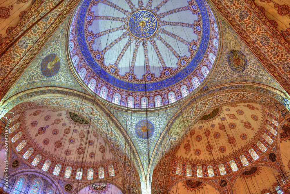 Istanbul, Turkey - Nov 26th 2013: The interior of Blue Mosque (Sultan Ahmed Mosque). HDR effect has been applied.